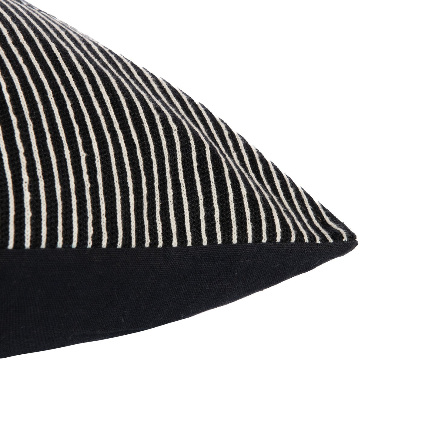 Black pillow with white stripes on a white background