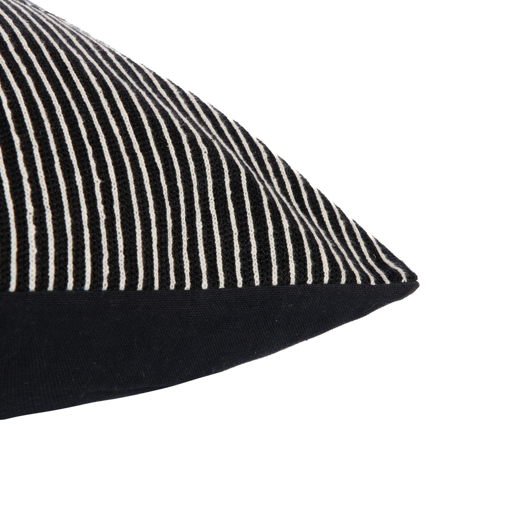 Black pillow with white stripes on a white background