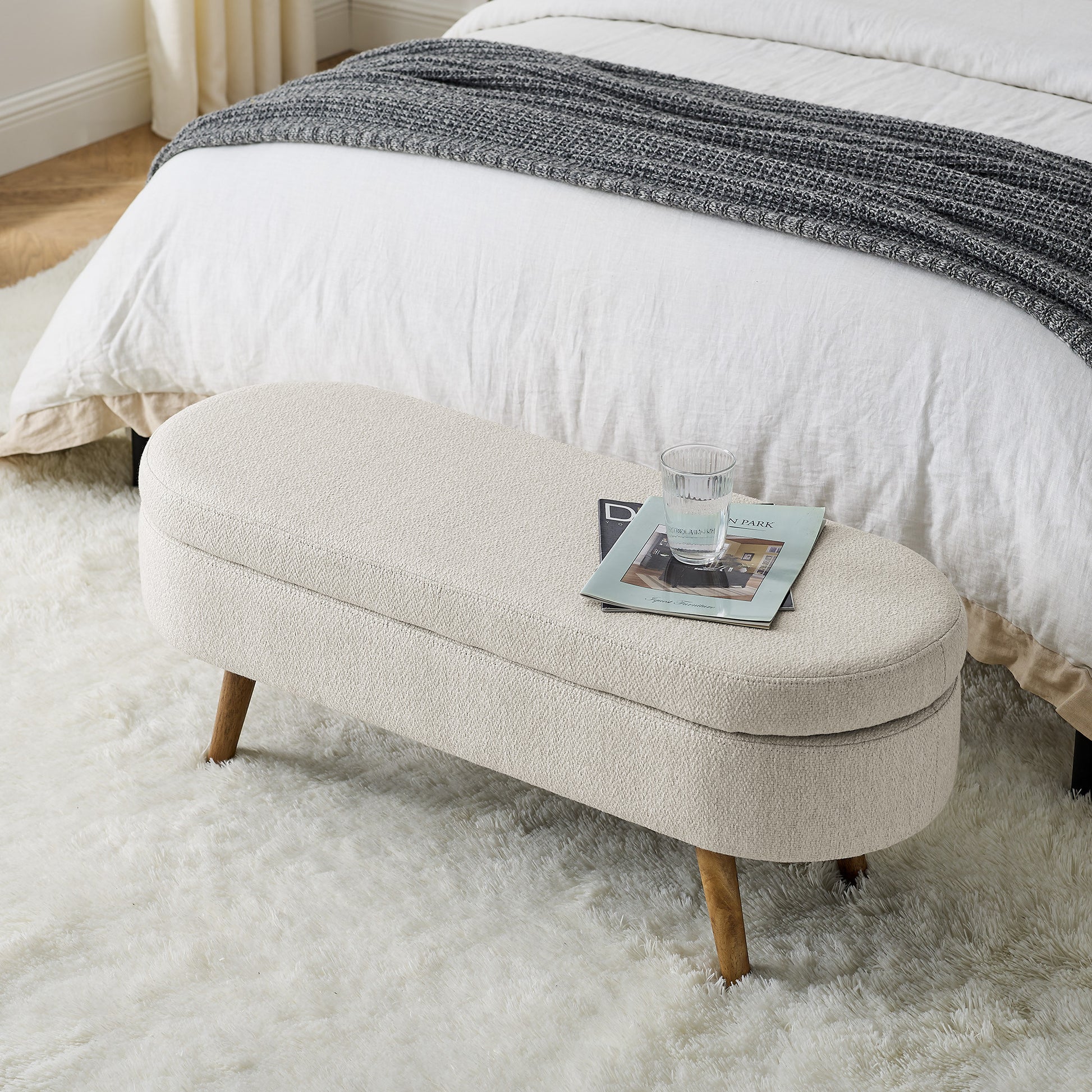 Palisades linen bench styled at the foot of a bed