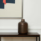 LAUREL 9" ANTIQUED GOLD METAL CYLINDER TABLE VASE