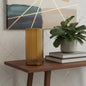 Palisades amber glass cylinder vase styled on a dark wood console