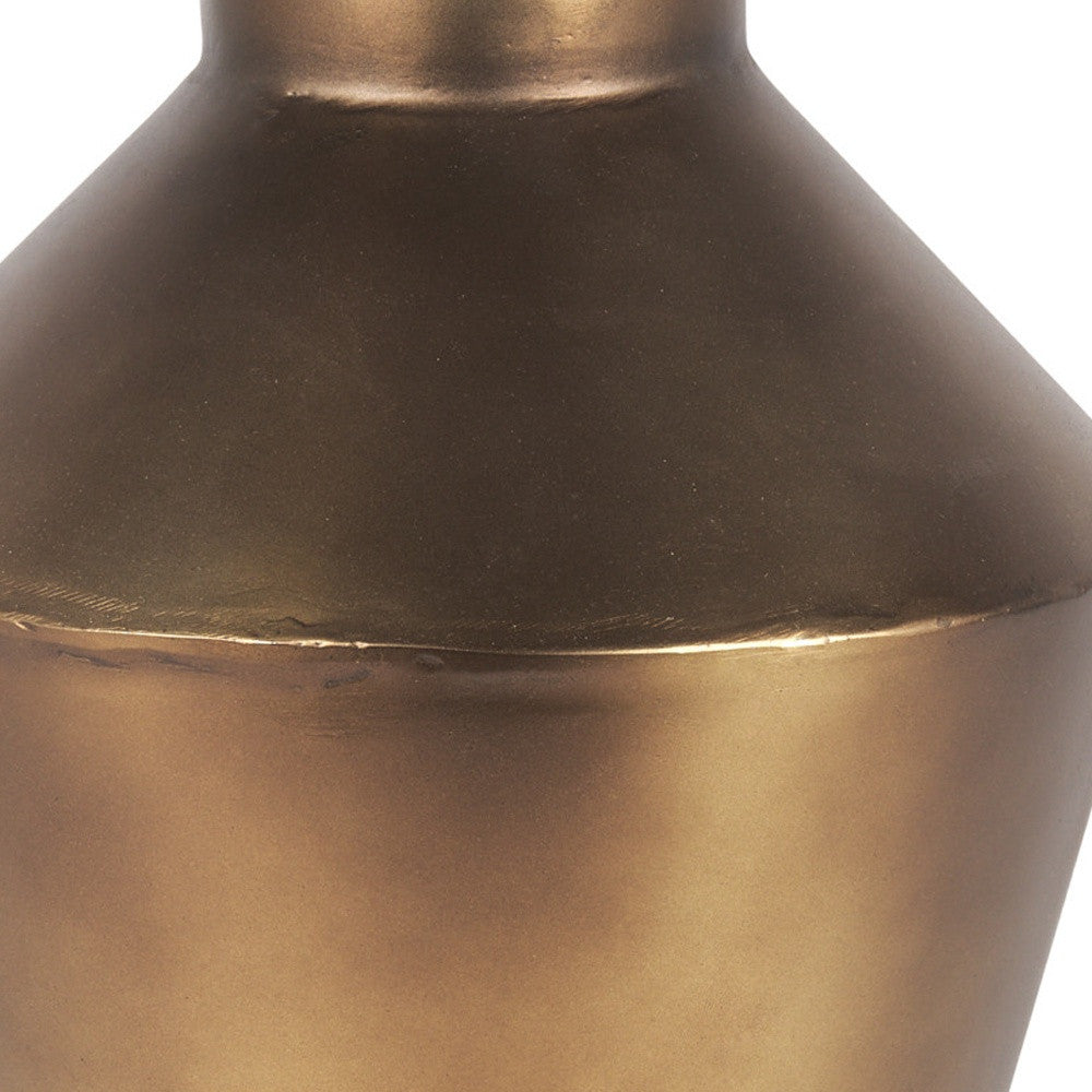 Detail of the trumpet shape and distressed finish on the bronze vase