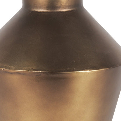 Detail of the trumpet shape and distressed finish on the bronze vase