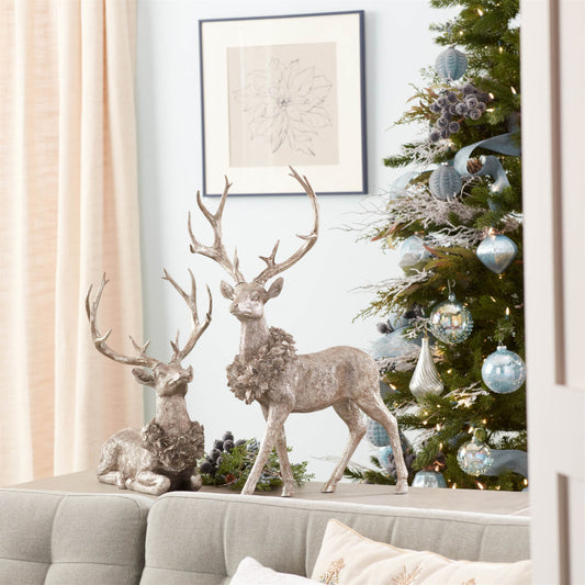 SET OF TWO SILVER AND BLACK REINDEER FIGURINES