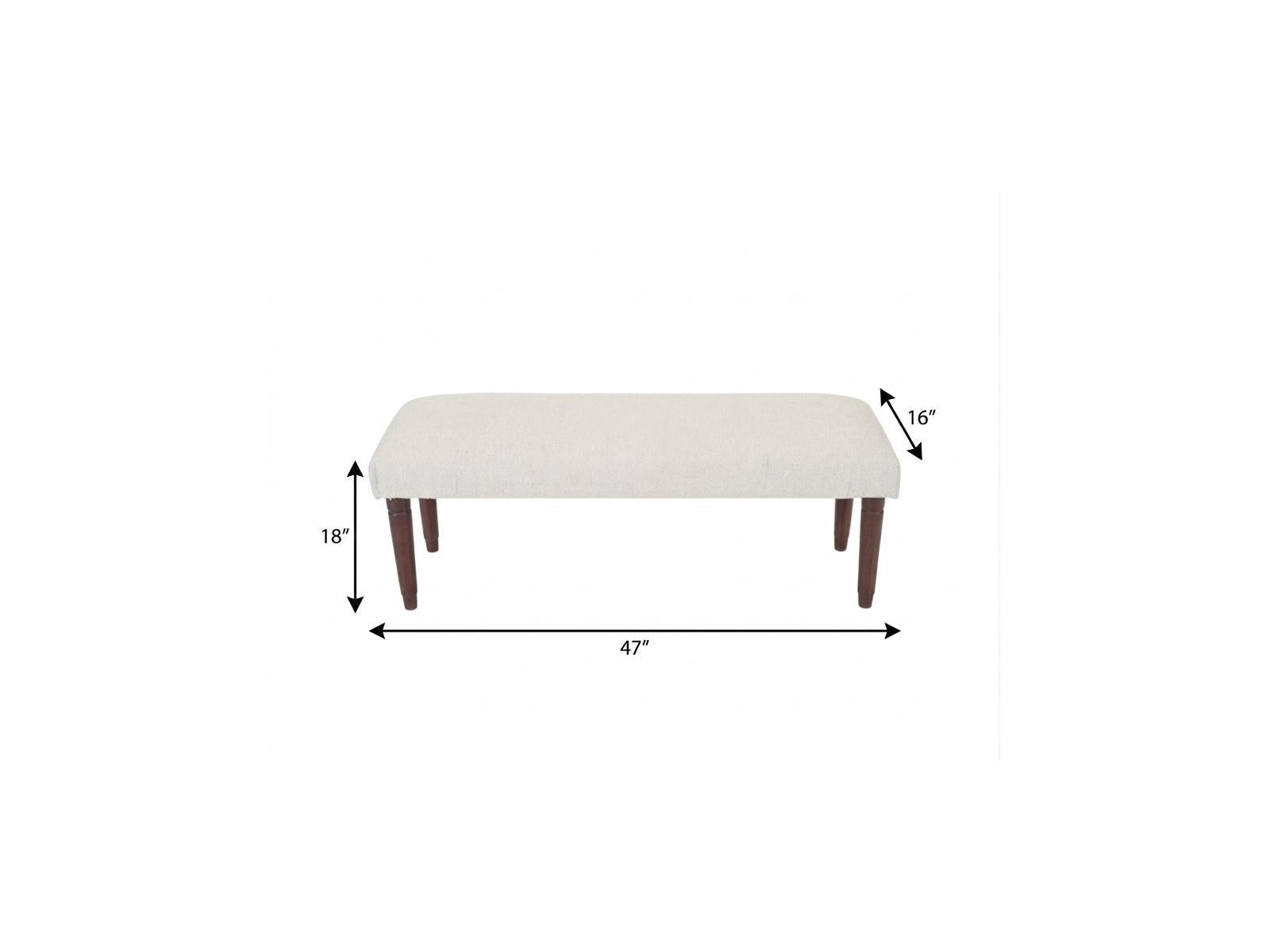 Cream boucle upholstered bench with mango wood legs from the Palisades fall collection, with measures