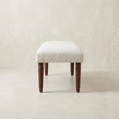 Side view of the 47-inch cream boucle upholstered bench