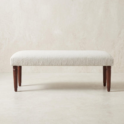 Cream boucle upholstered bench with mango wood legs from the Palisades fall collection