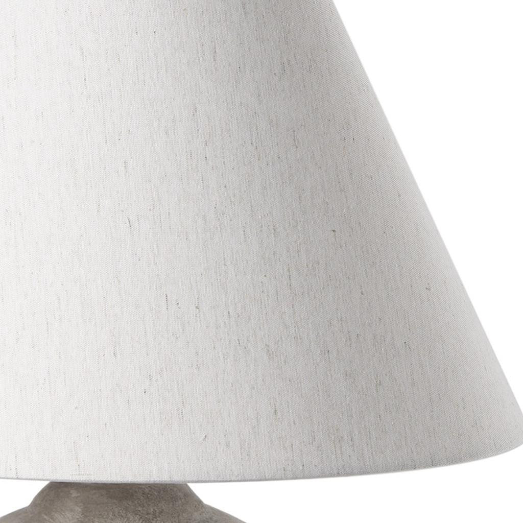 Close-up of the tan ceramic lamp base texture