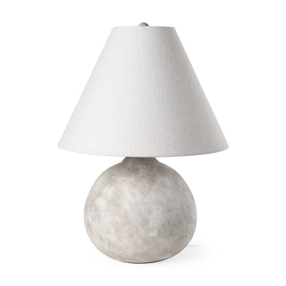 Tan ceramic table lamp with cream bell shade from the Palisades fall collection