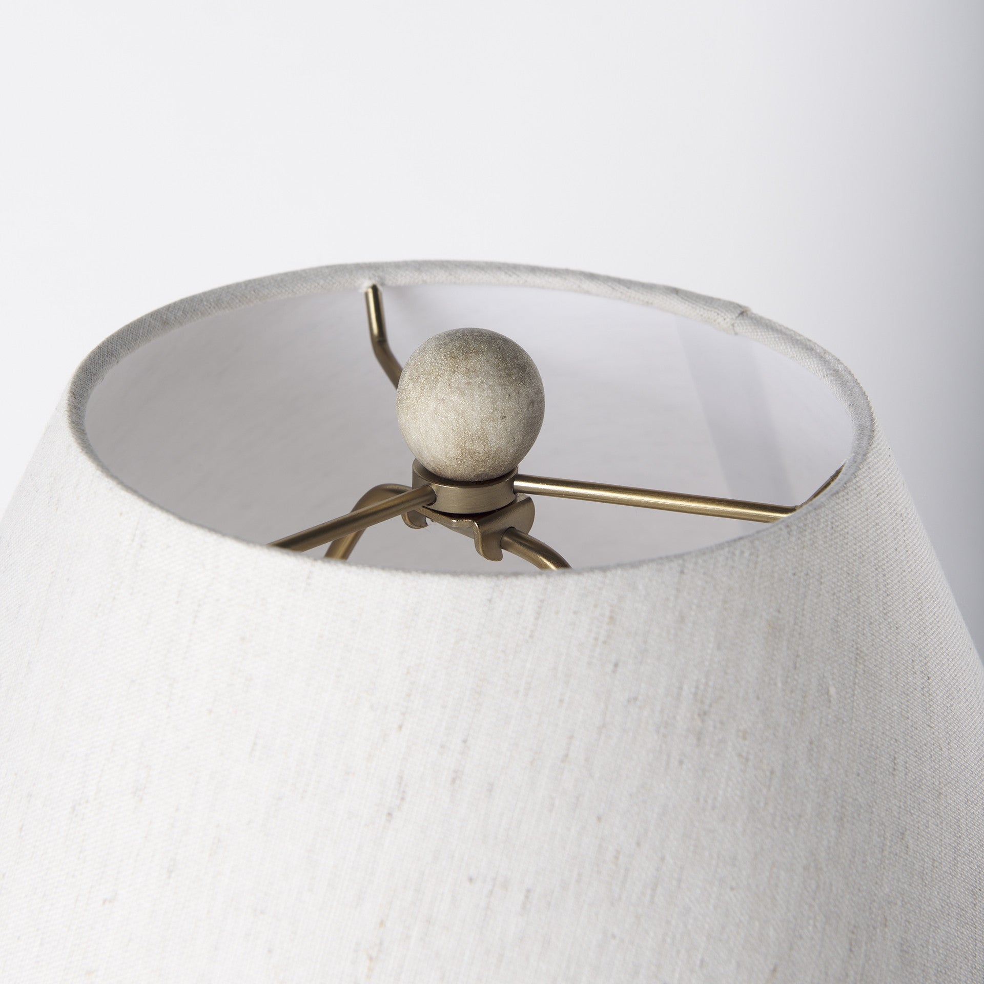 Cream bell-shaped fabric shade on the Palisades table lamp