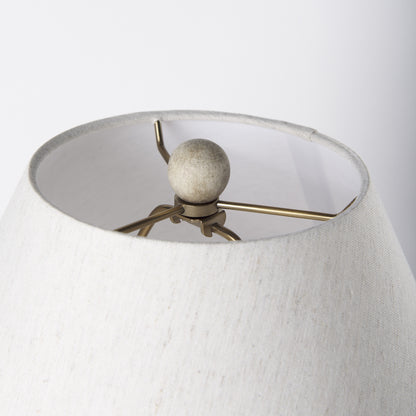 Cream bell-shaped fabric shade on the Palisades table lamp
