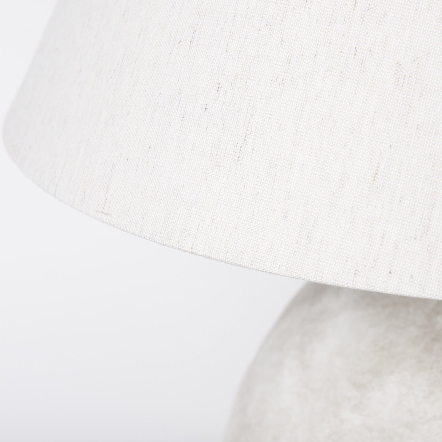 Close-up of the tan ceramic lamp base texture