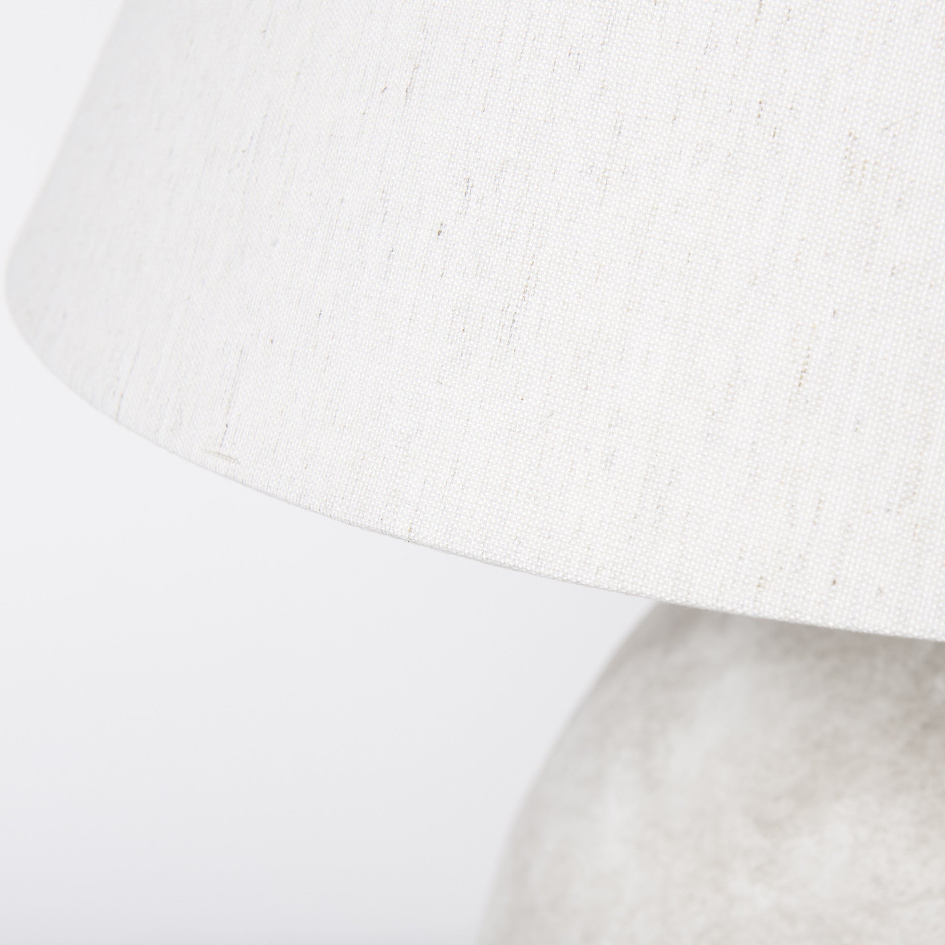 Close-up of the tan ceramic lamp base texture