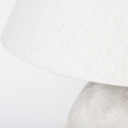 Close-up of the tan ceramic lamp base texture