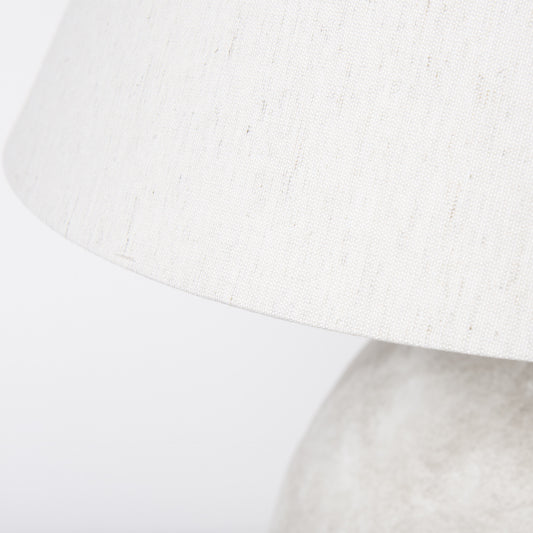 Close-up of the tan ceramic lamp base texture