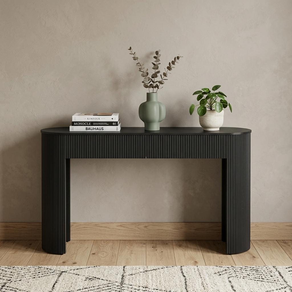 Palisades console table styled with vases and books in an entryway